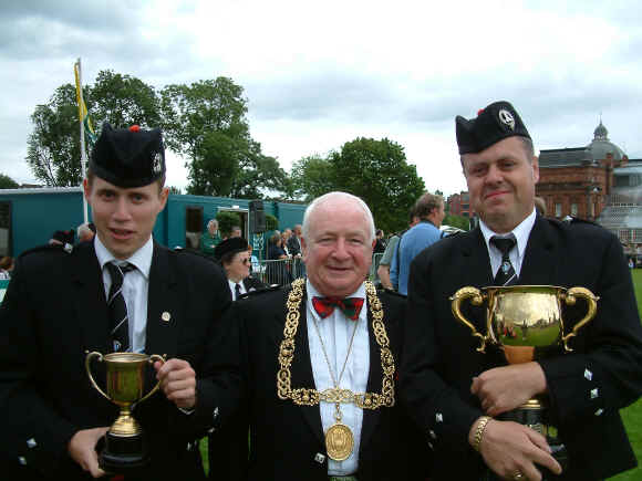 Paul & Ian Being presented with the best Bass and best Drum Corps prizes at the Worlds in Glasgow